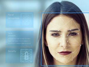 Woman with concept of facial recognition technology
